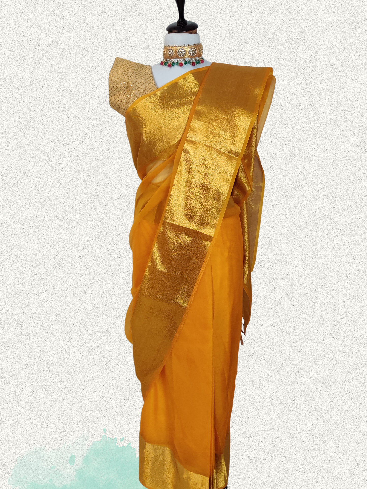 Radiant Yellow Organza Saree with Intricate Golden Zari Borders