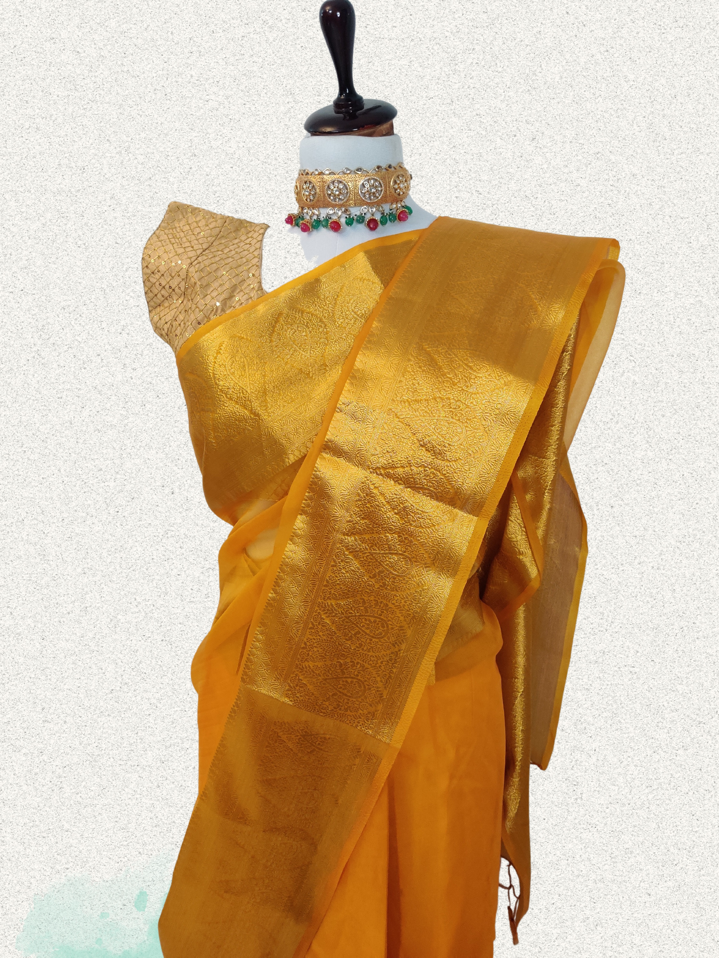 Radiant Yellow Organza Saree with Intricate Golden Zari Borders